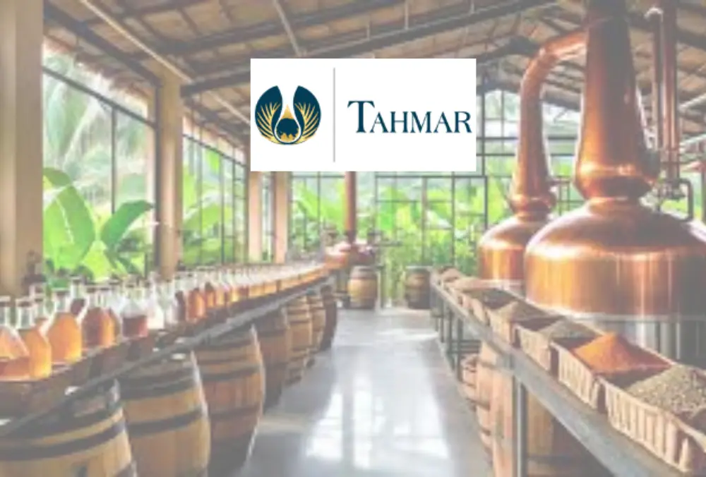 Tahmar Enterprises distillery with copper stills and barrels