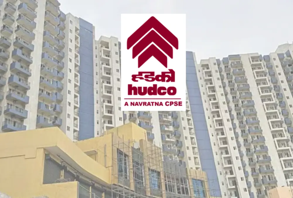 HUDCO logo over high-rise residential apartment buildings
