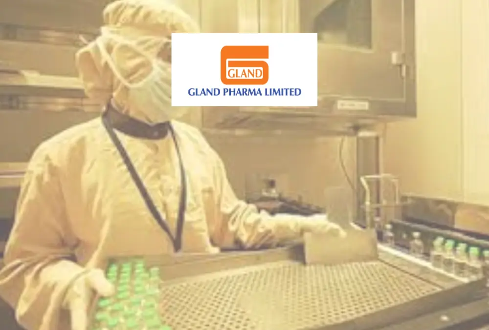 Gland Pharma logo over sterile lab technician handling vials