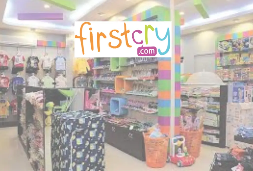 FirstCry logo over colorful baby and kids store interior