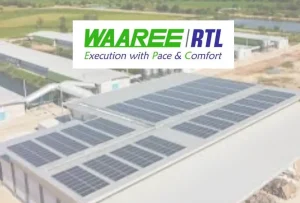 Waaree logo over rooftop solar panels on industrial building