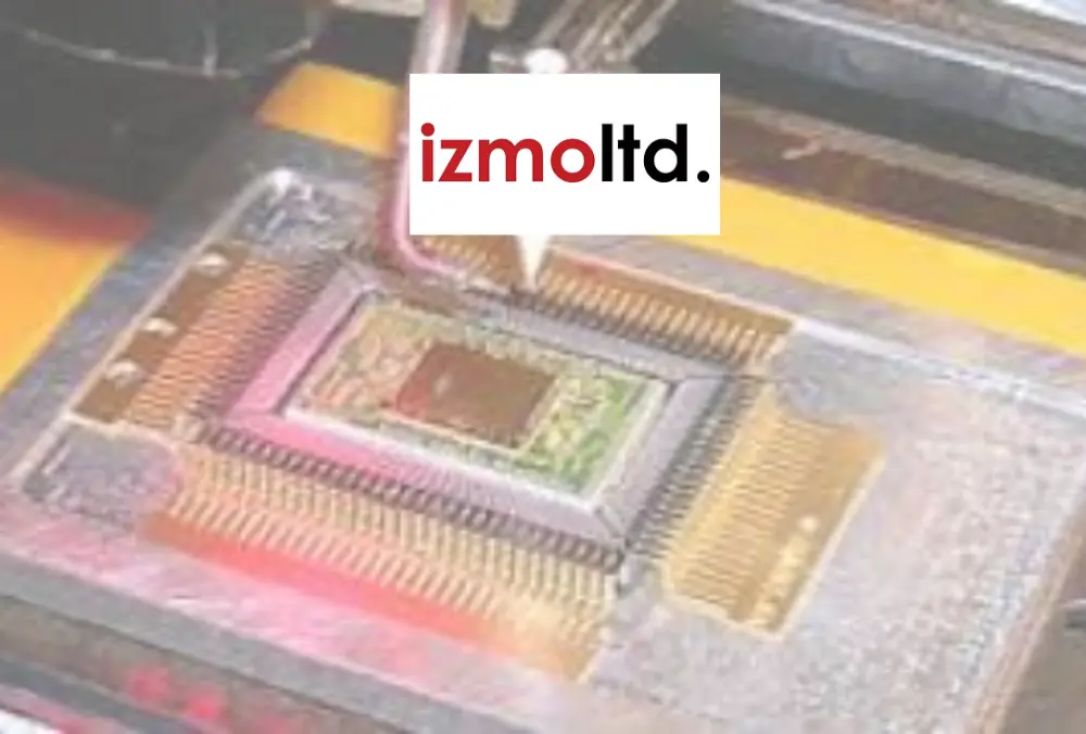 Izmo Ltd. logo over microchip manufacturing close-up