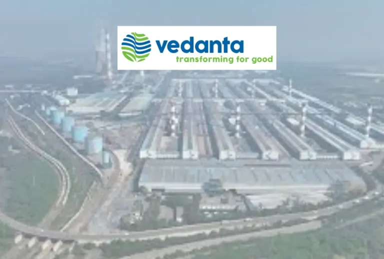 Vedanta logo over aerial view of large industrial complex