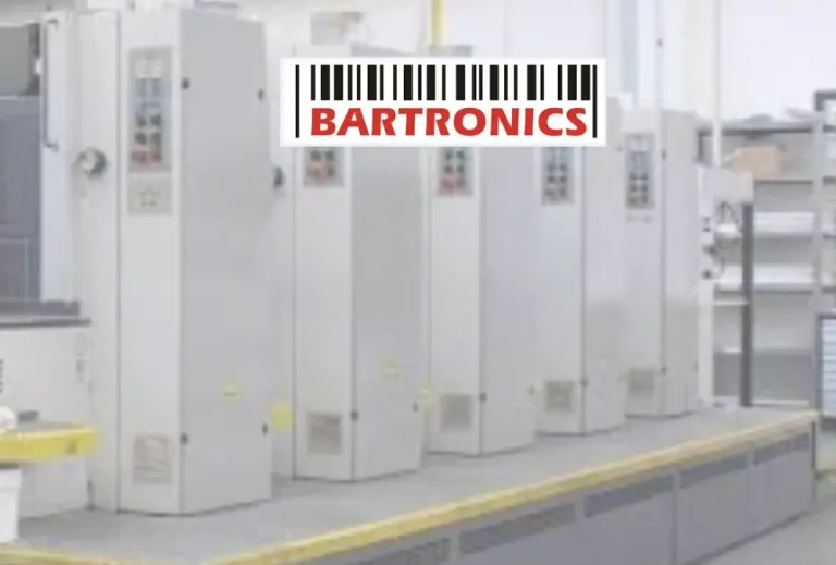 Bartronics logo over industrial electronics equipment line