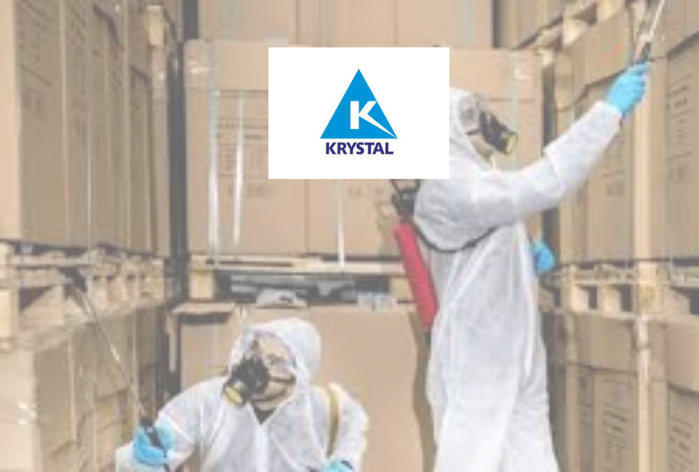 Krystal logo over workers in protective gear handling boxes