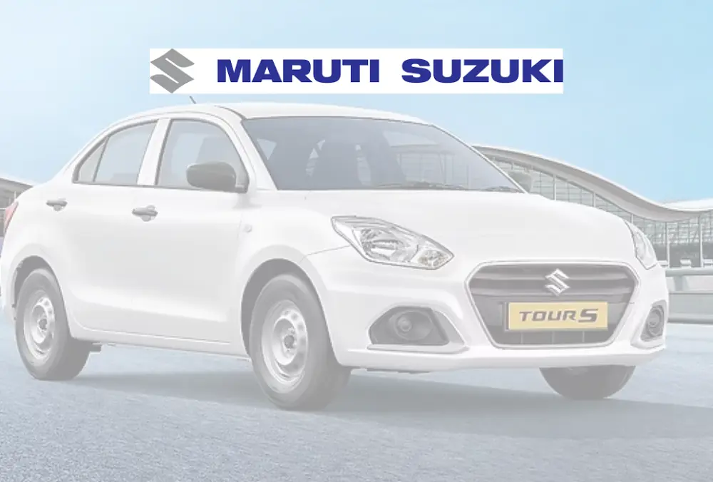 Maruti Suzuki logo above white sedan car on road