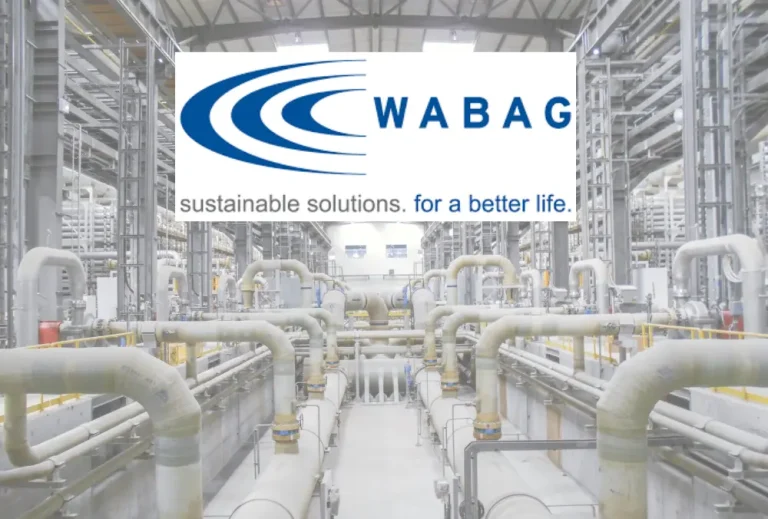 WABAG logo over industrial water treatment plant piping