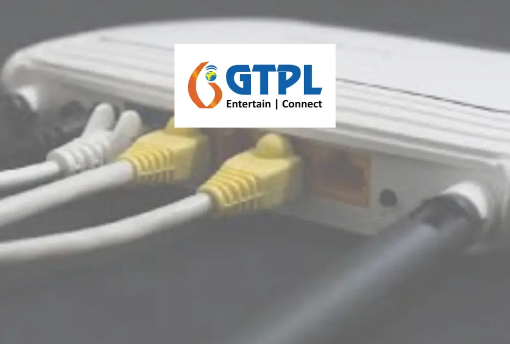 GTPL logo over router with connected Ethernet cables