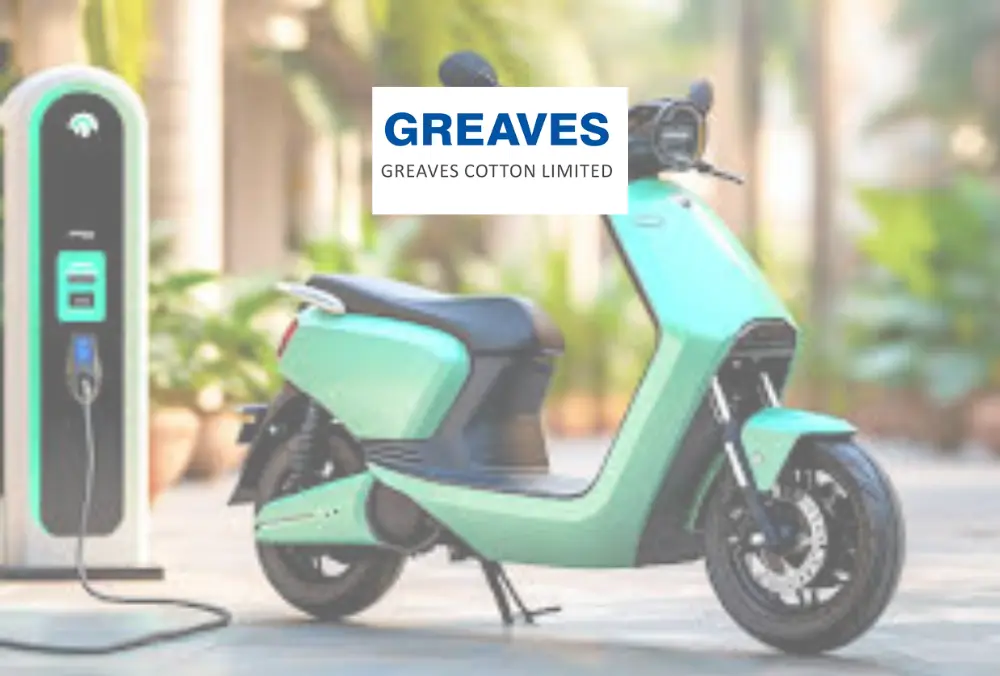 Greaves electric scooter charging at EV station outdoors