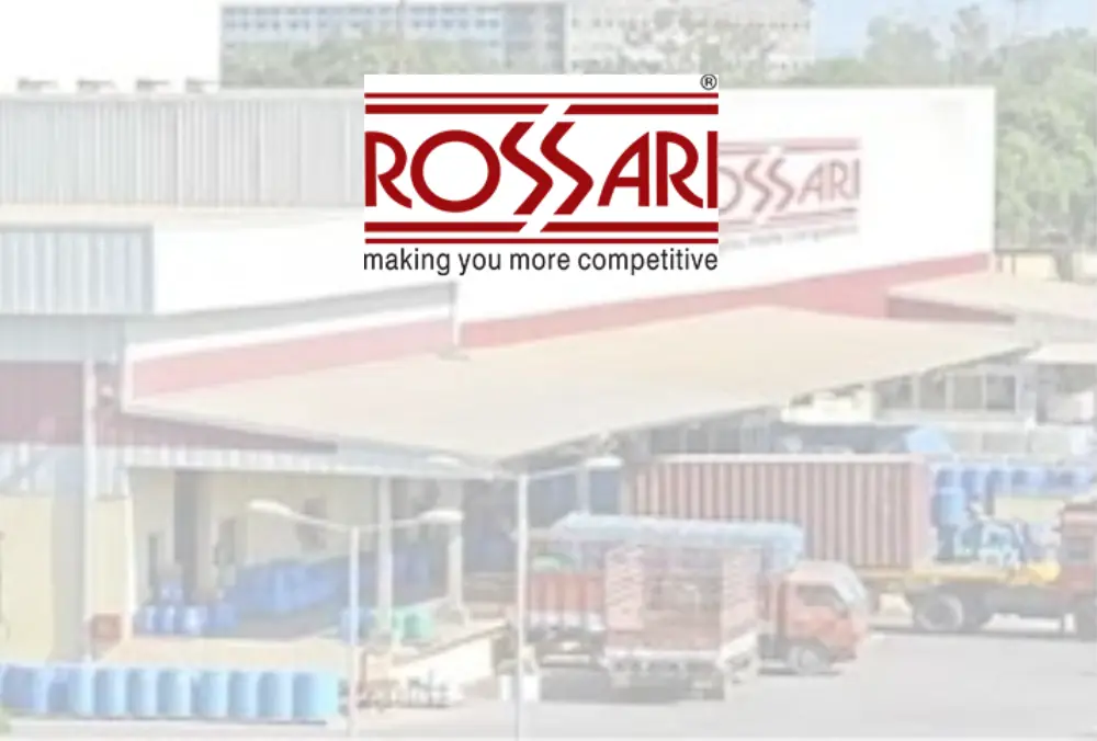 Rossari logo over industrial facility with trucks and containers