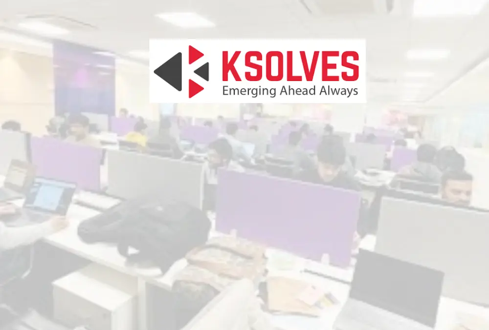 KSolves logo displayed over a modern office workspace background