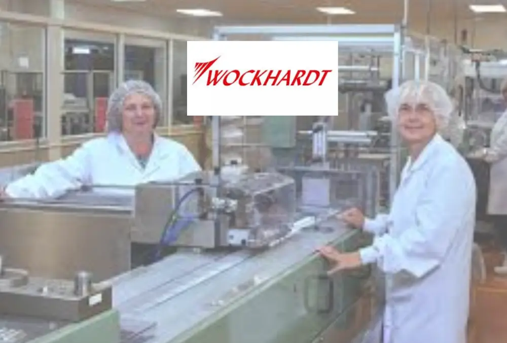 Wockhardt logo displayed over pharmaceutical manufacturing facility