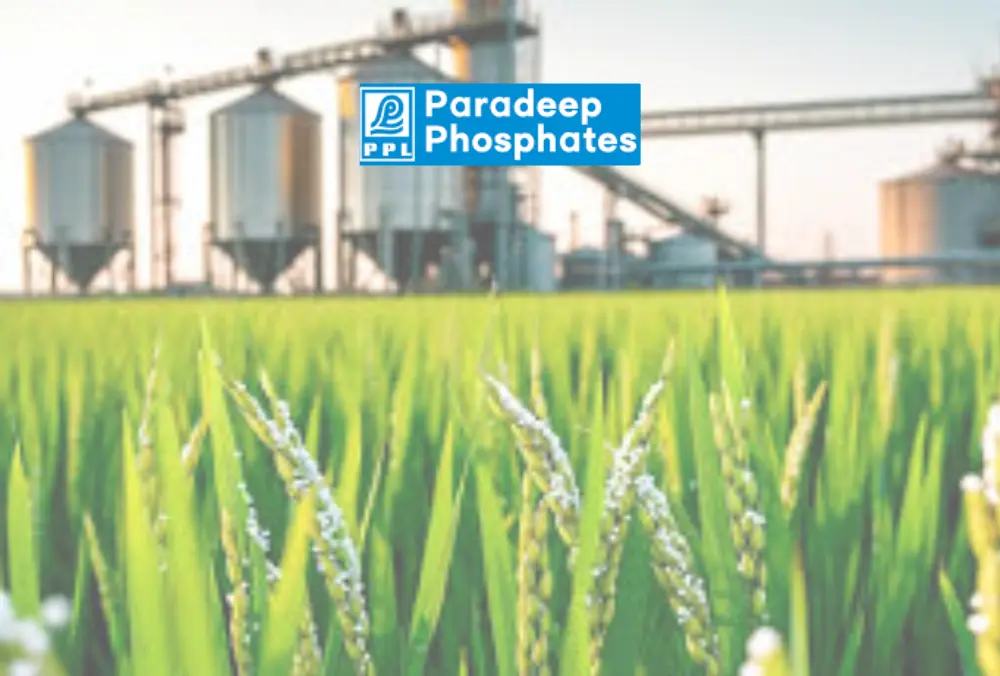 Paradeep Phosphates plant with green crop field foreground