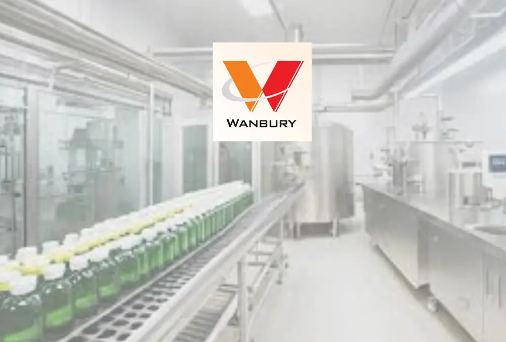 Wanbury logo displayed over pharmaceutical production line