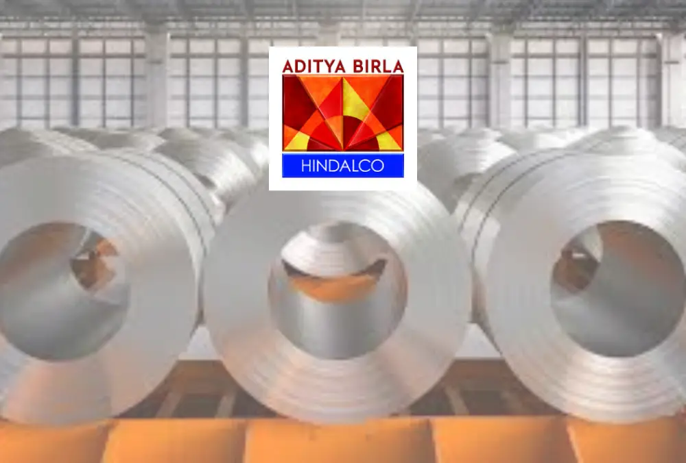 Hindalco logo displayed over aluminum coil manufacturing plant